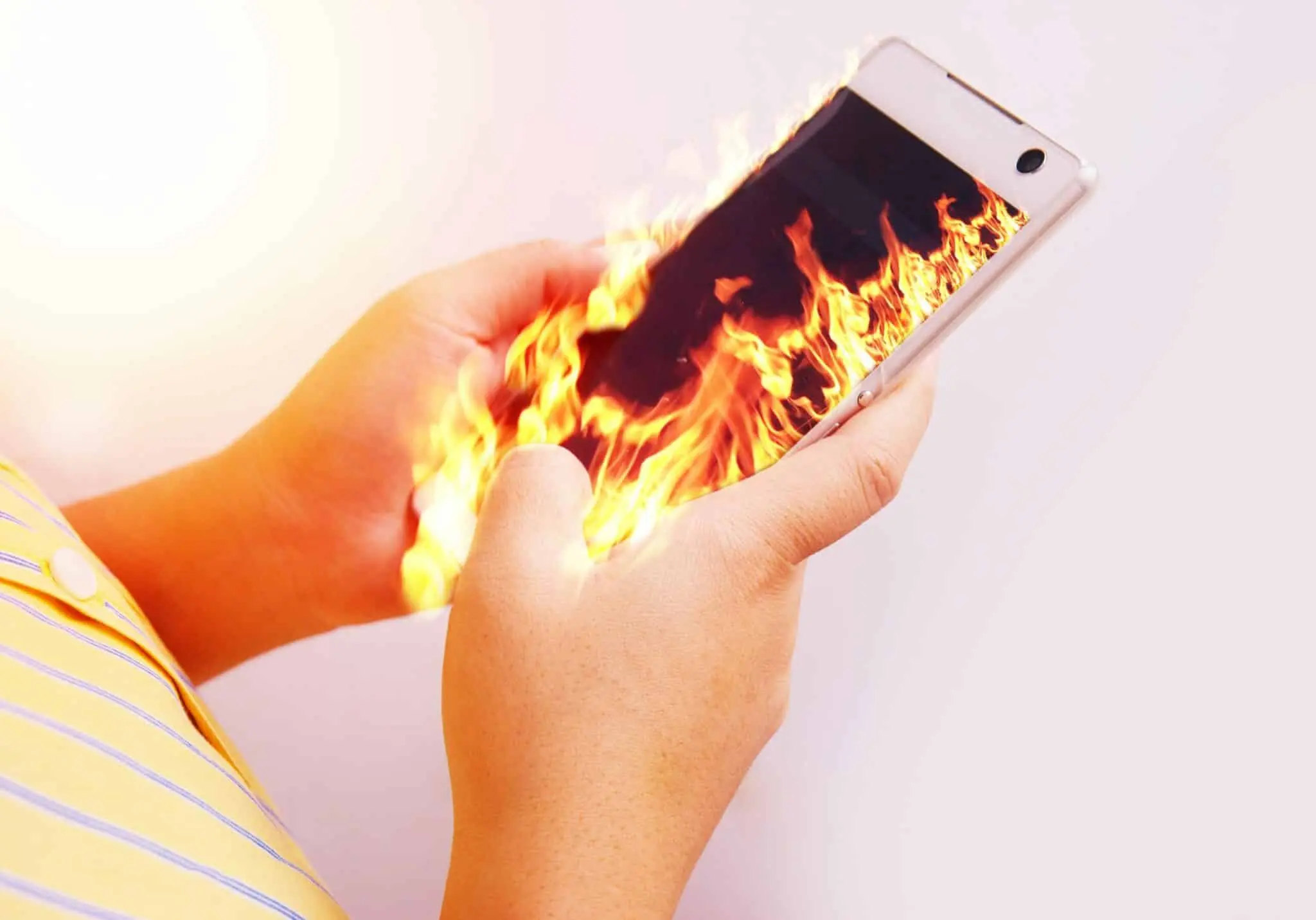 Smartphone overheating warning screen indicating high temperature