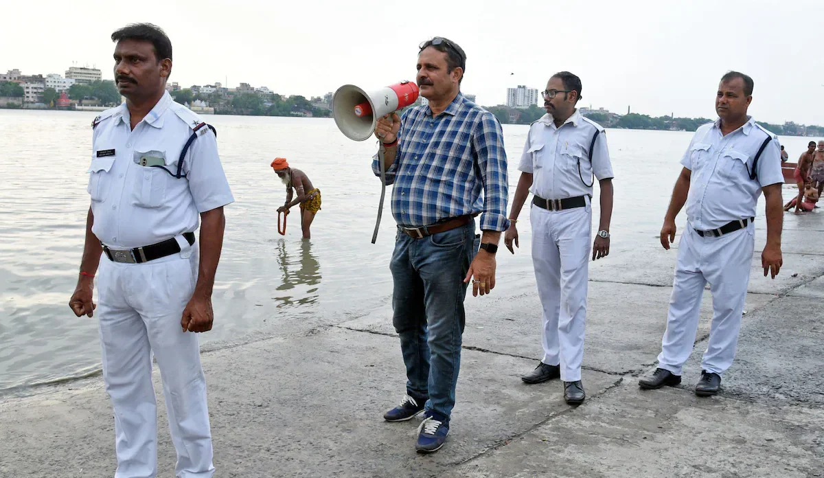 Coastal residents preparing for Cyclone Remal's landfall. 