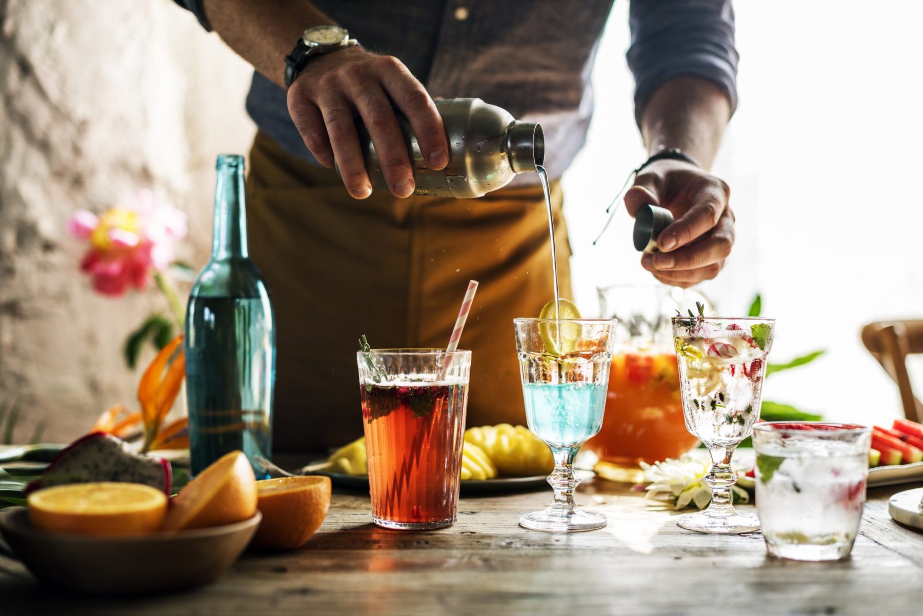 A selection of classic cocktails, including a Martini and a Mojito, showcasing the diversity of drinks celebrated on World Cocktail Day.