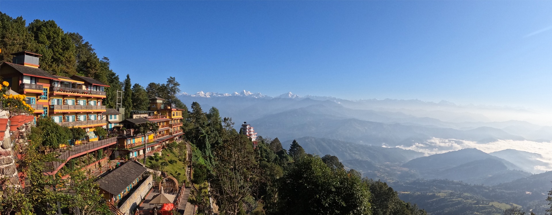 Traditional Nepalese meal with dal bhat, momos, and Newari delicacies in Nagarkot. 