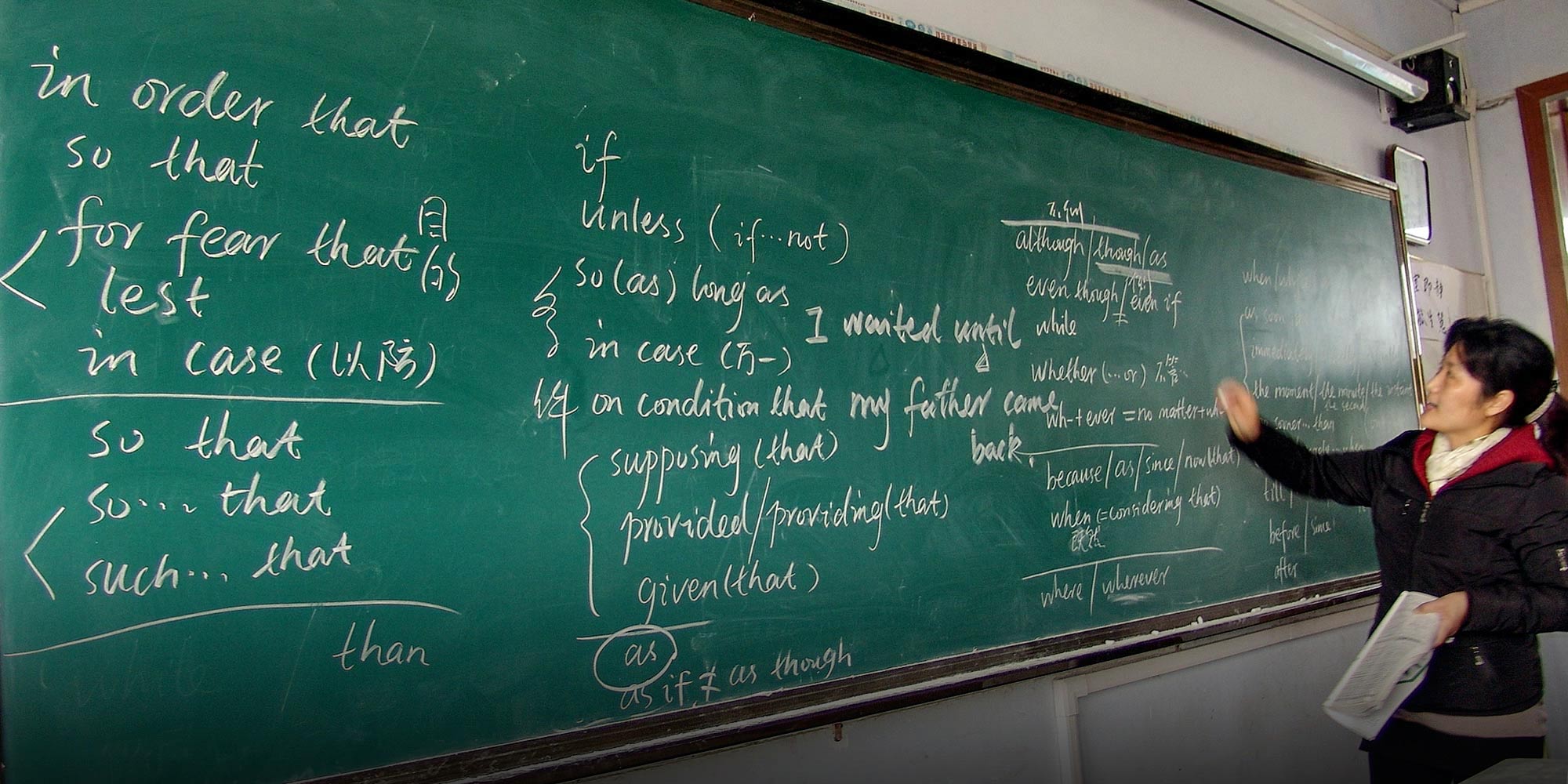 Students preparing intensely for the Gaokao in a classroom. 