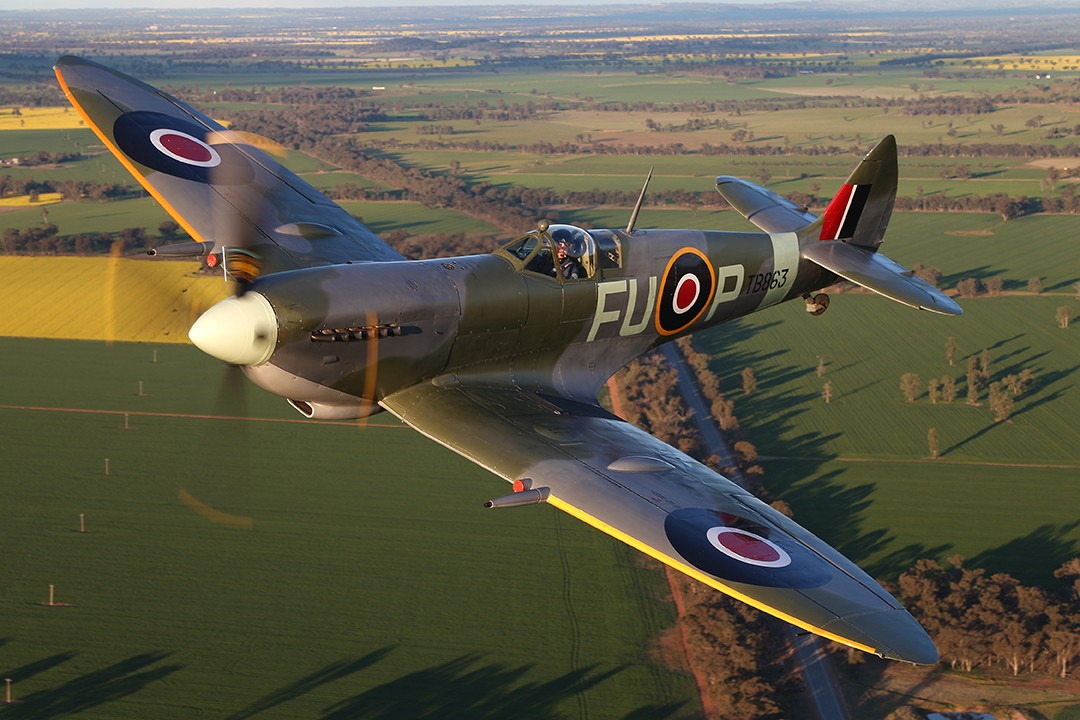 Restored Supermarine Spitfire on display at an airshow. 