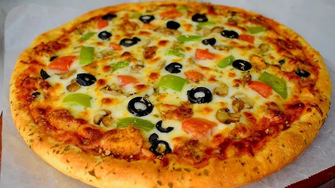 Classic Margherita pizza served on a wooden table 